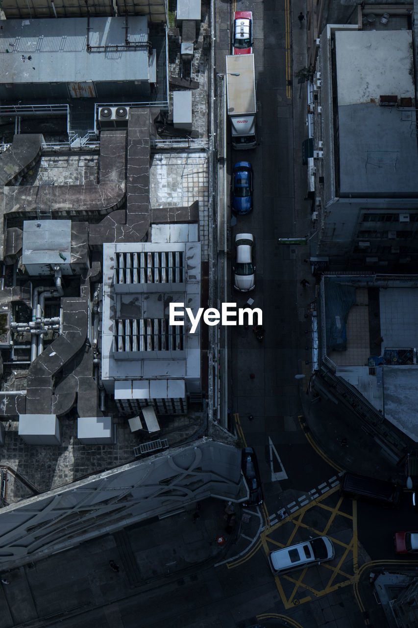 High angle view of construction site by buildings in city