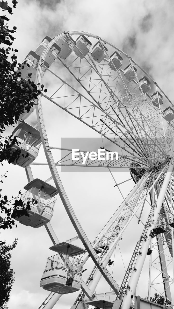 amusement park, amusement park ride, ferris wheel, black and white, arts culture and entertainment, monochrome photography, monochrome, sky, white, nature, carnival, traveling carnival, black, cloud, low angle view, architecture, fun, recreation, leisure activity, outdoors, no people, amusement ride, wheel, day, enjoyment, shape, geometric shape, park, travel destinations, built structure