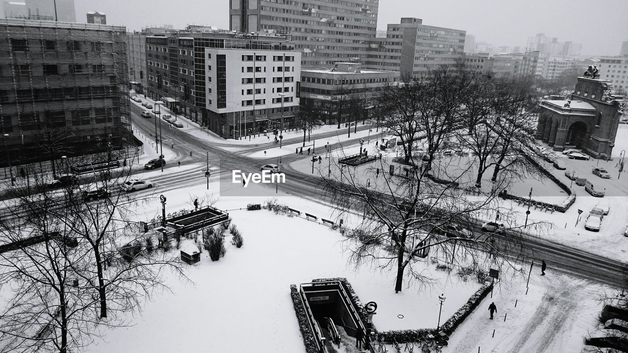 High angle view of road along buildings in winter