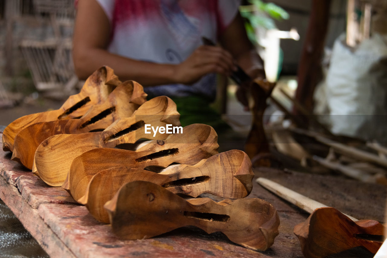 Close-up of man working on wood