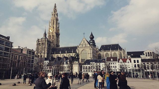 TOURISTS ON CITY STREET