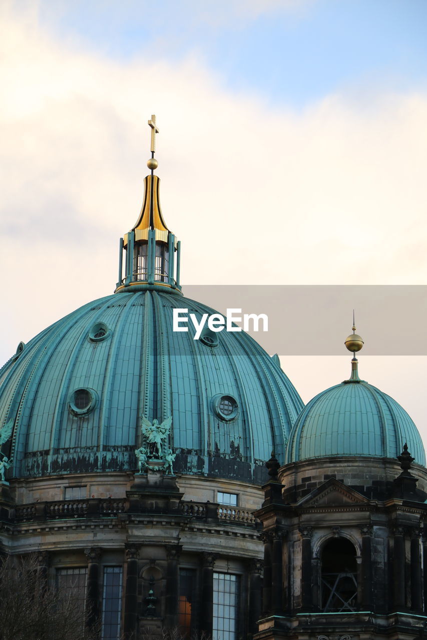 Berlin cathedral against cloudy sky