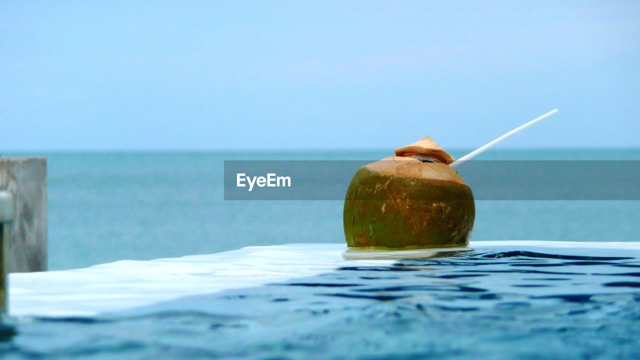 Coconut drink in swimming pool