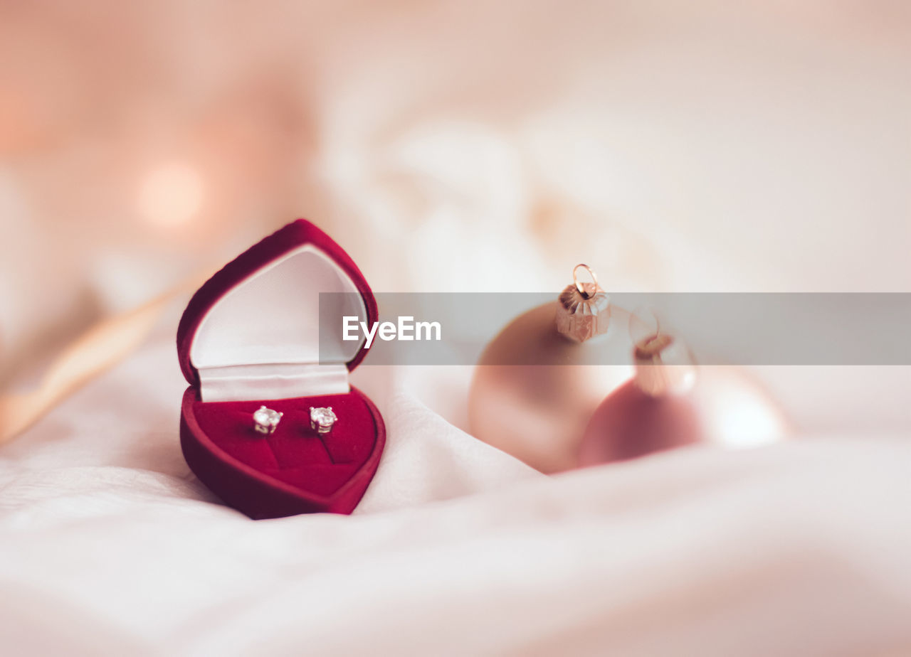 high angle view of wedding rings on table