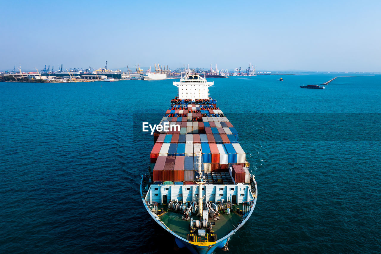  container cargo ship carrying commercial container import export business delivery service 