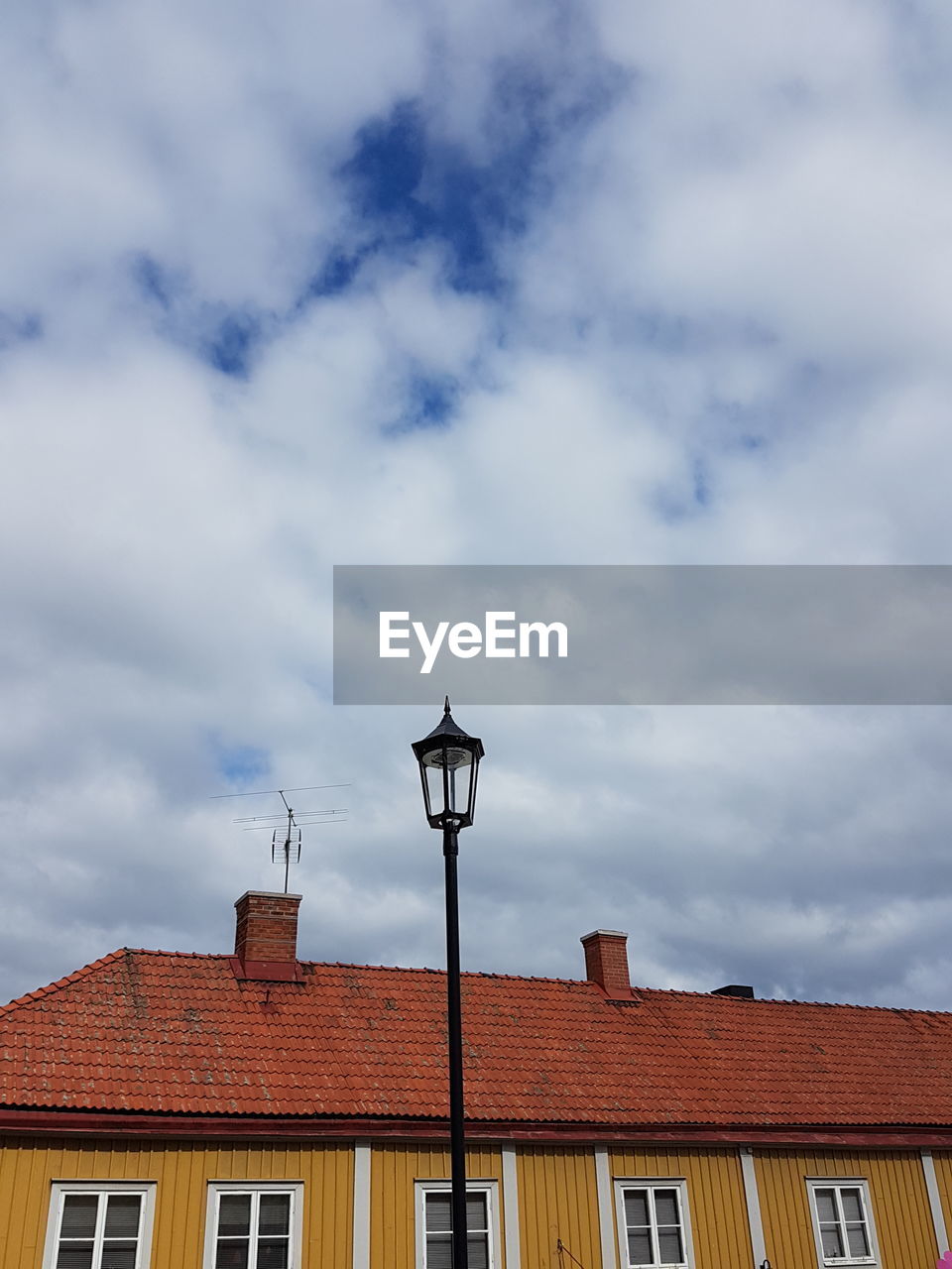 LOW ANGLE VIEW OF BUILT STRUCTURES AGAINST SKY
