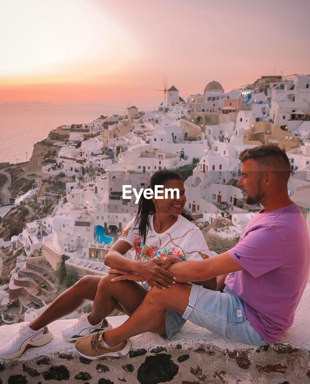 Couple on vacation at the greek islands santorini 