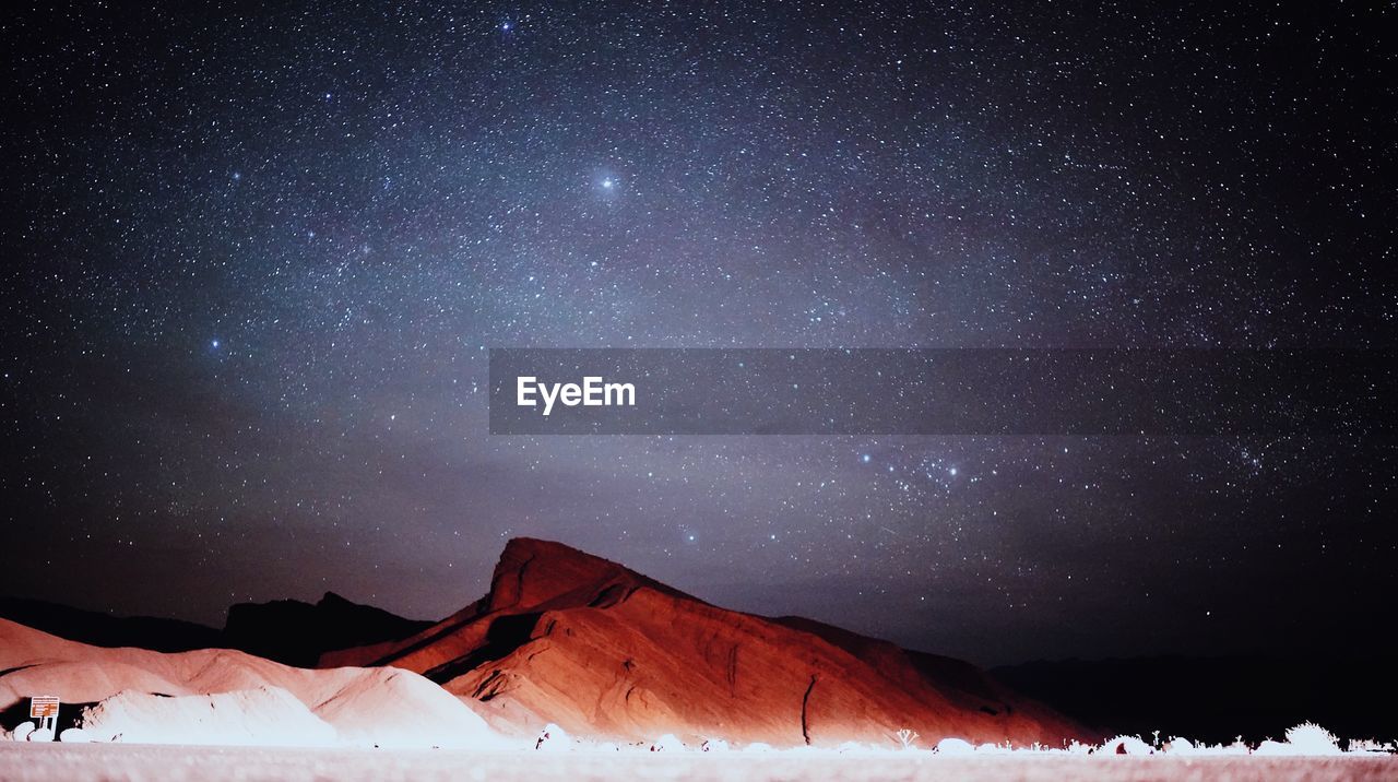 SCENIC VIEW OF SNOWCAPPED MOUNTAIN AGAINST SKY