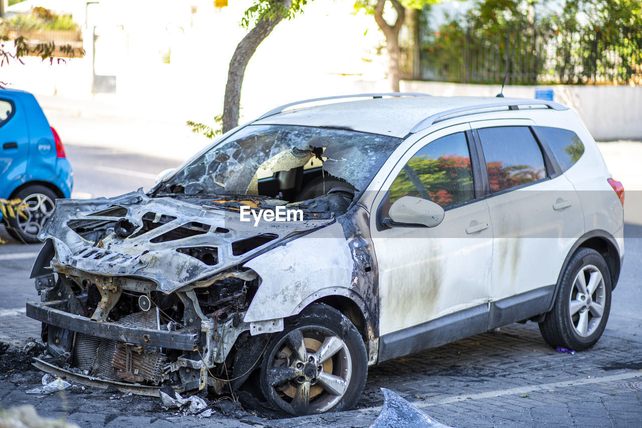 Abandoned car on street