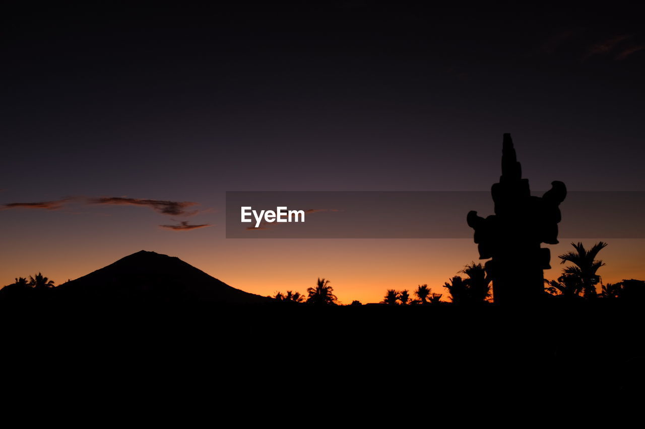 Silhouette of mountain at sunset