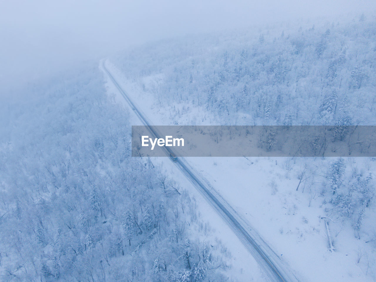 Aerial view of snow covered land