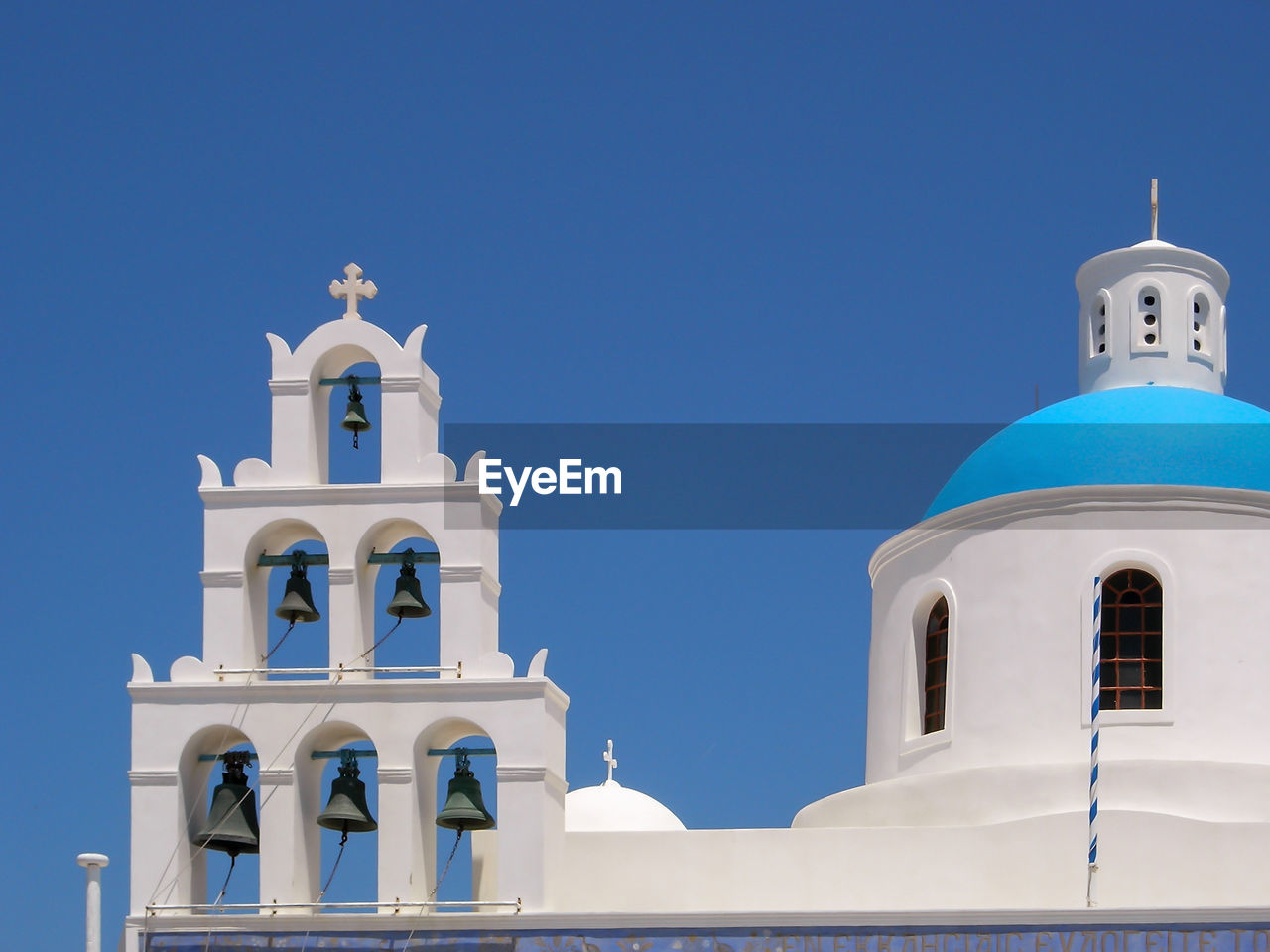 High section of church against clear blue sky