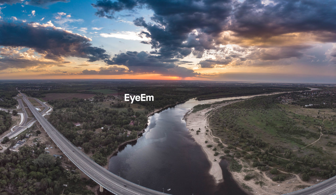 Aerial view of landscape against sky during sunset