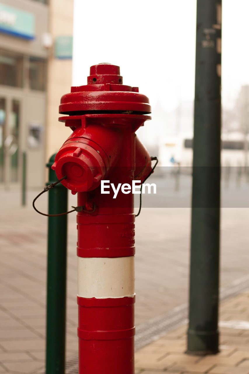 Red fire hydrant on the street