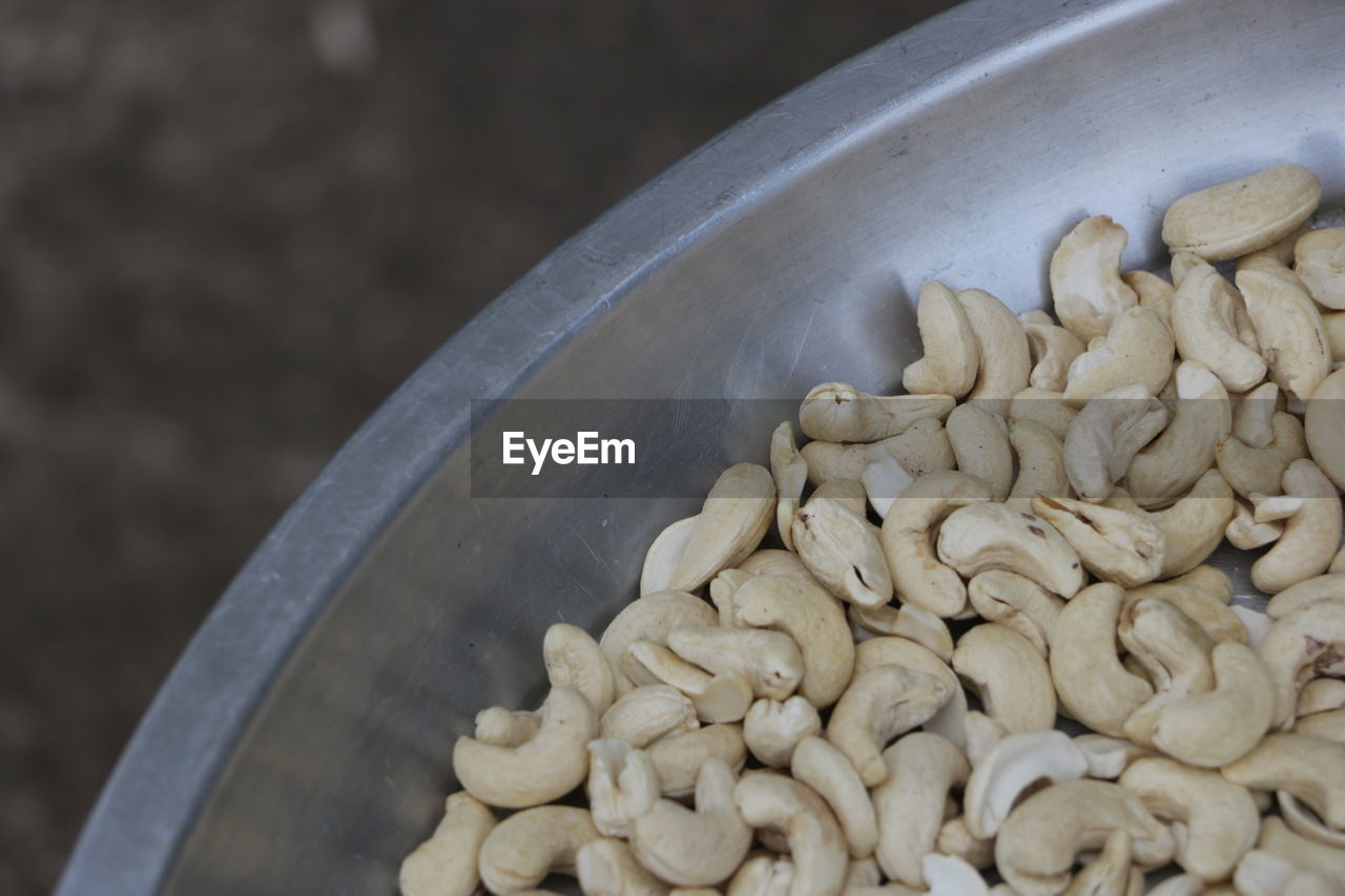 Close-up of cashews in container