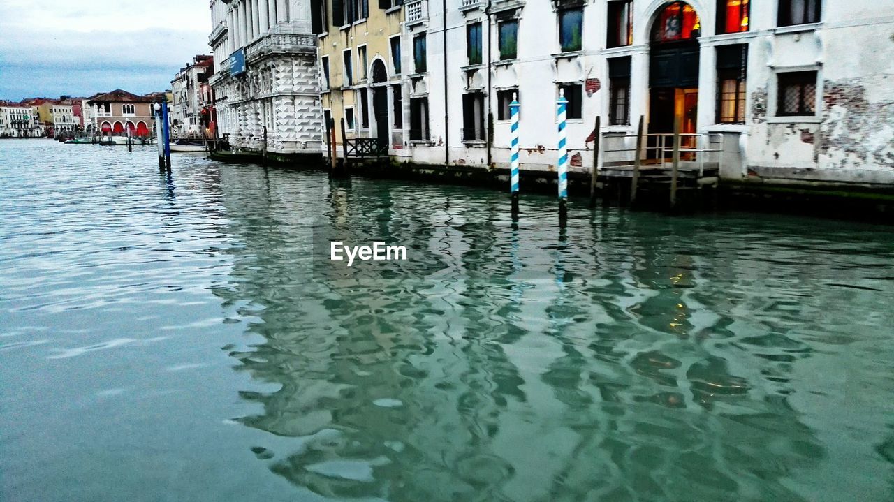 VIEW OF CANAL ALONG HOUSES