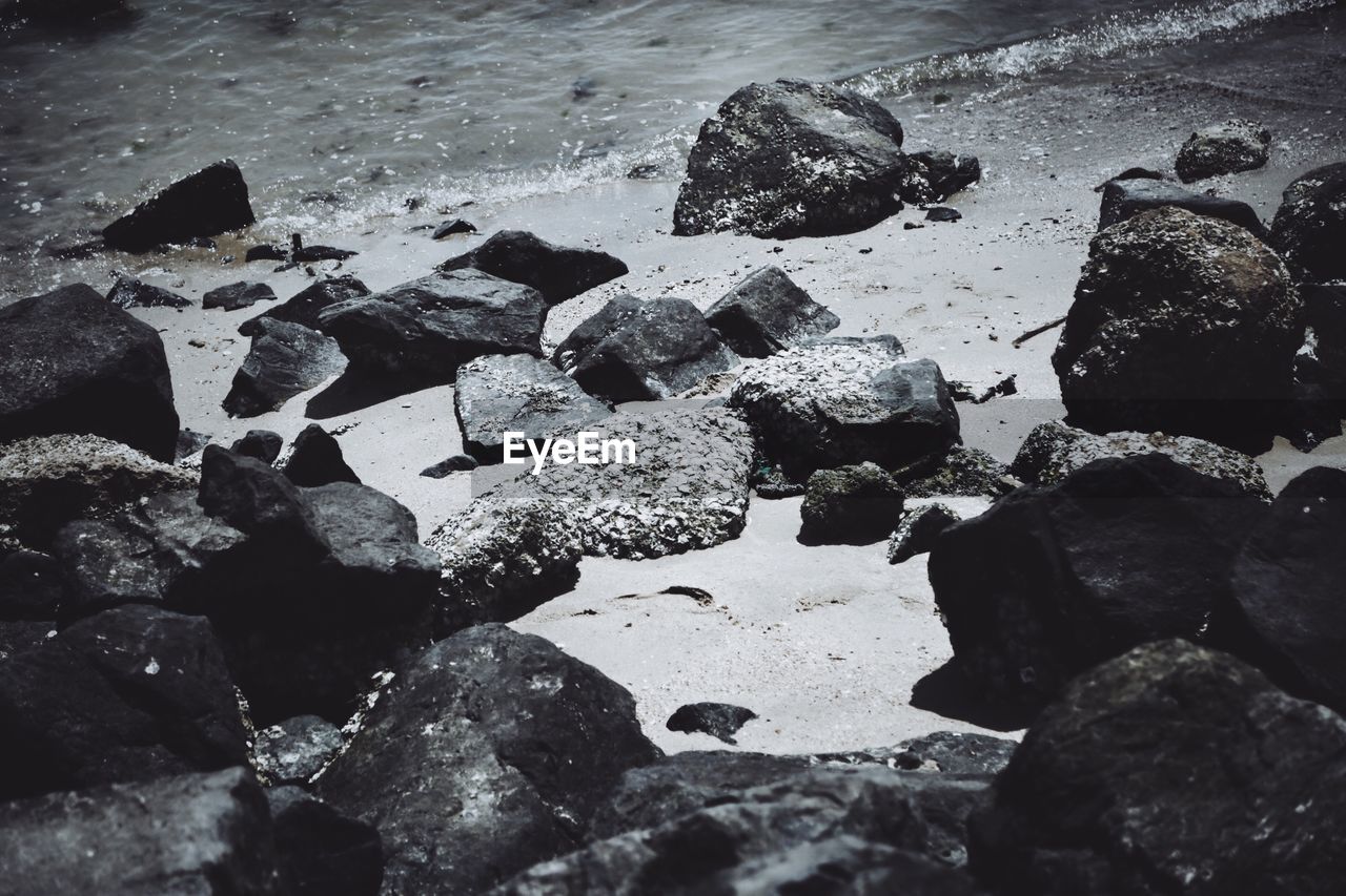 High angle view of rocks at beach