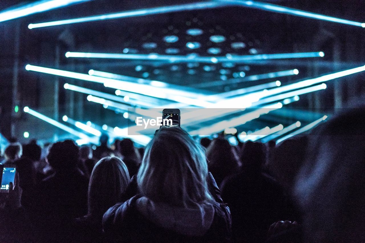 Rear view of people at music concert