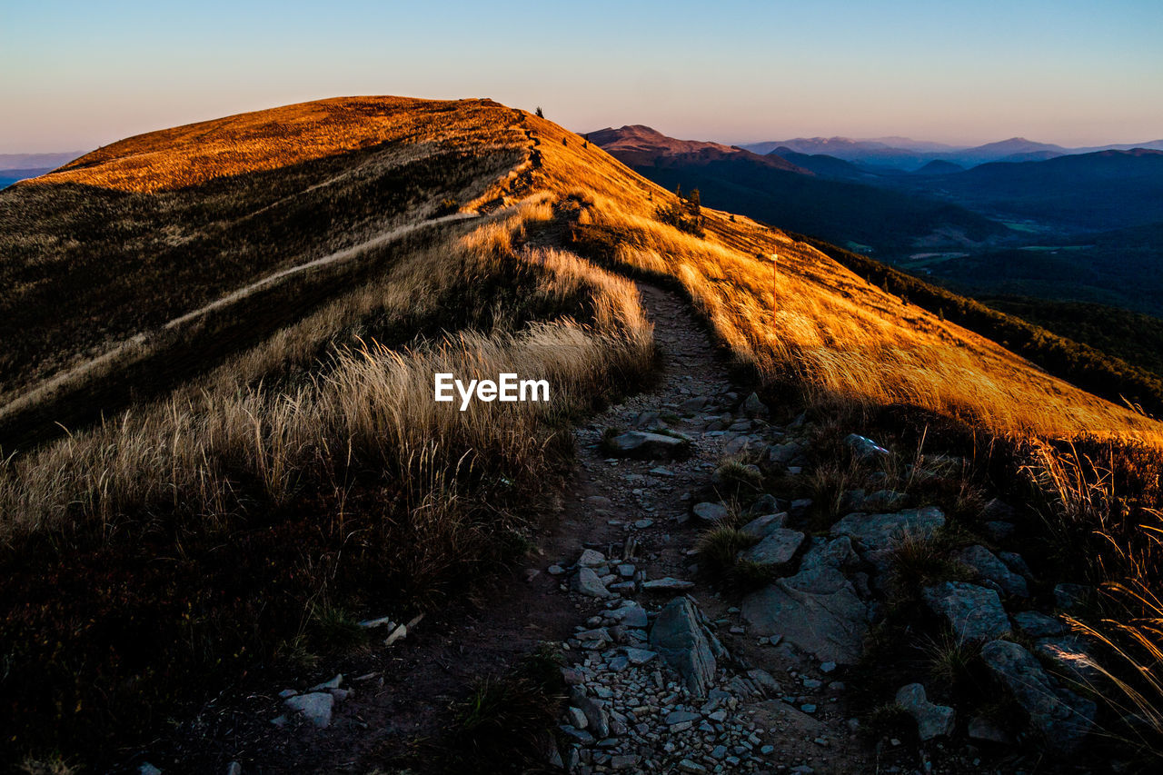 SCENIC VIEW OF MOUNTAIN AGAINST SKY