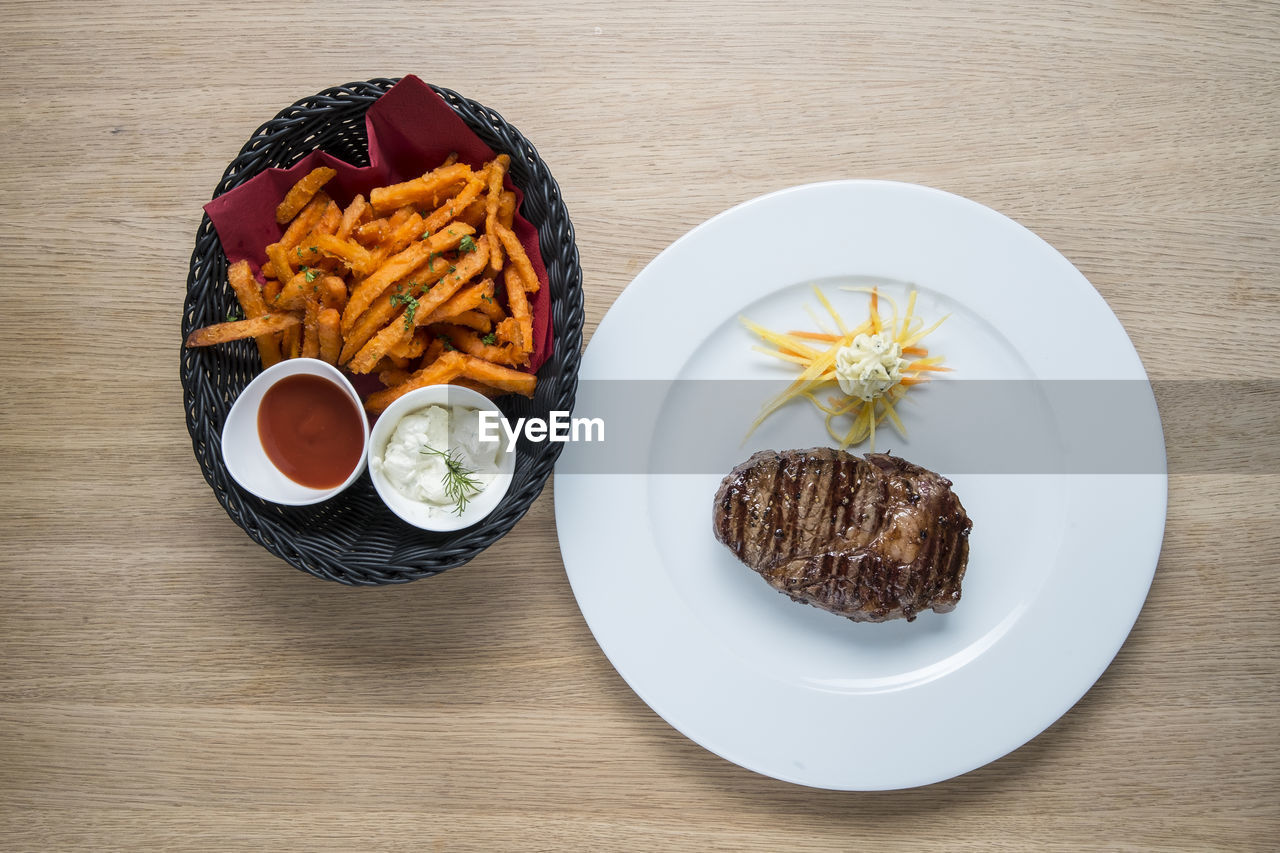 Directly above shot of food served on table