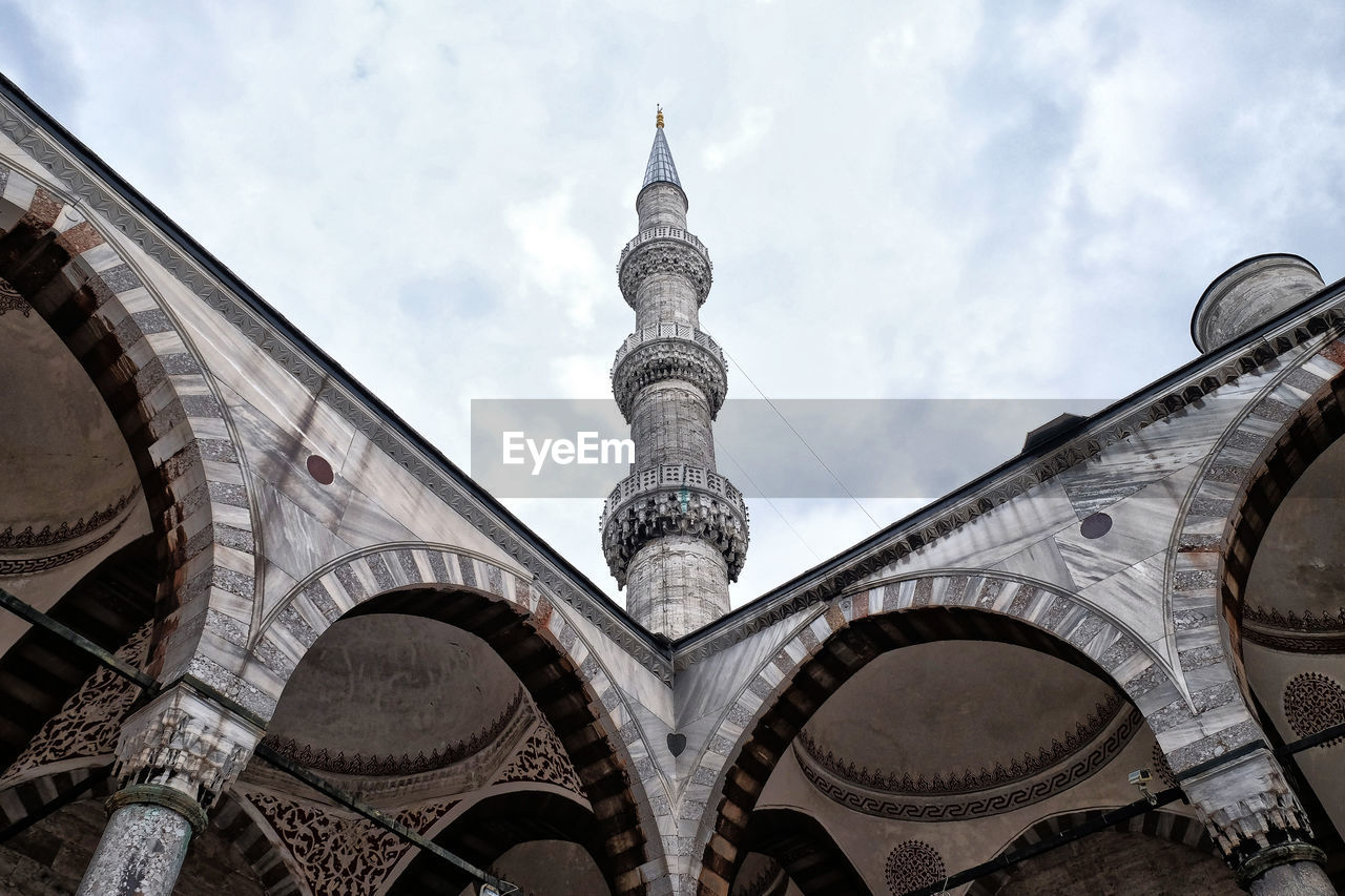 Low angle view of mosque against sky