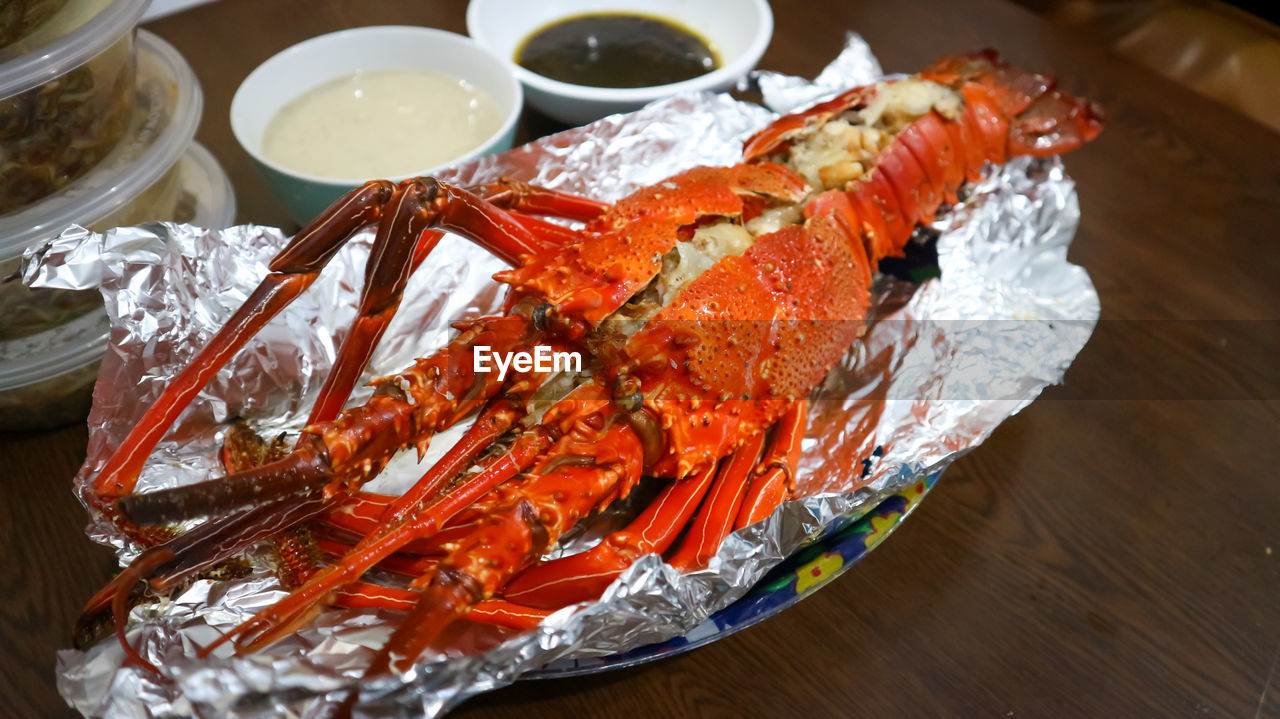 High angle view of lobster in plate on table