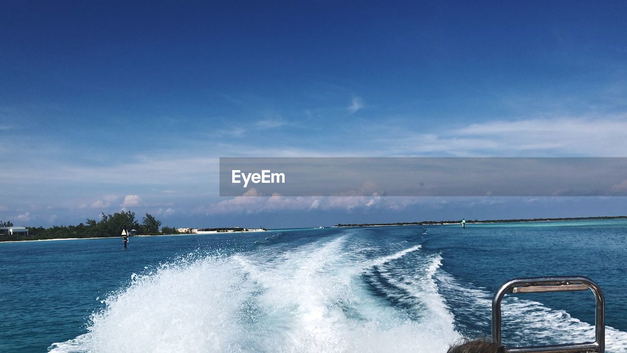 Scenic view of sea against blue sky