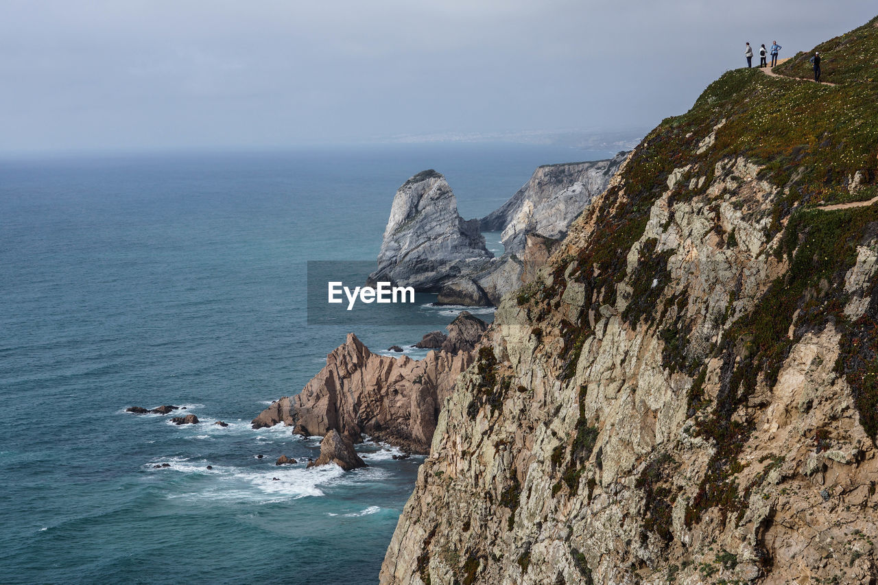 SCENIC VIEW OF SEA AND ROCKS