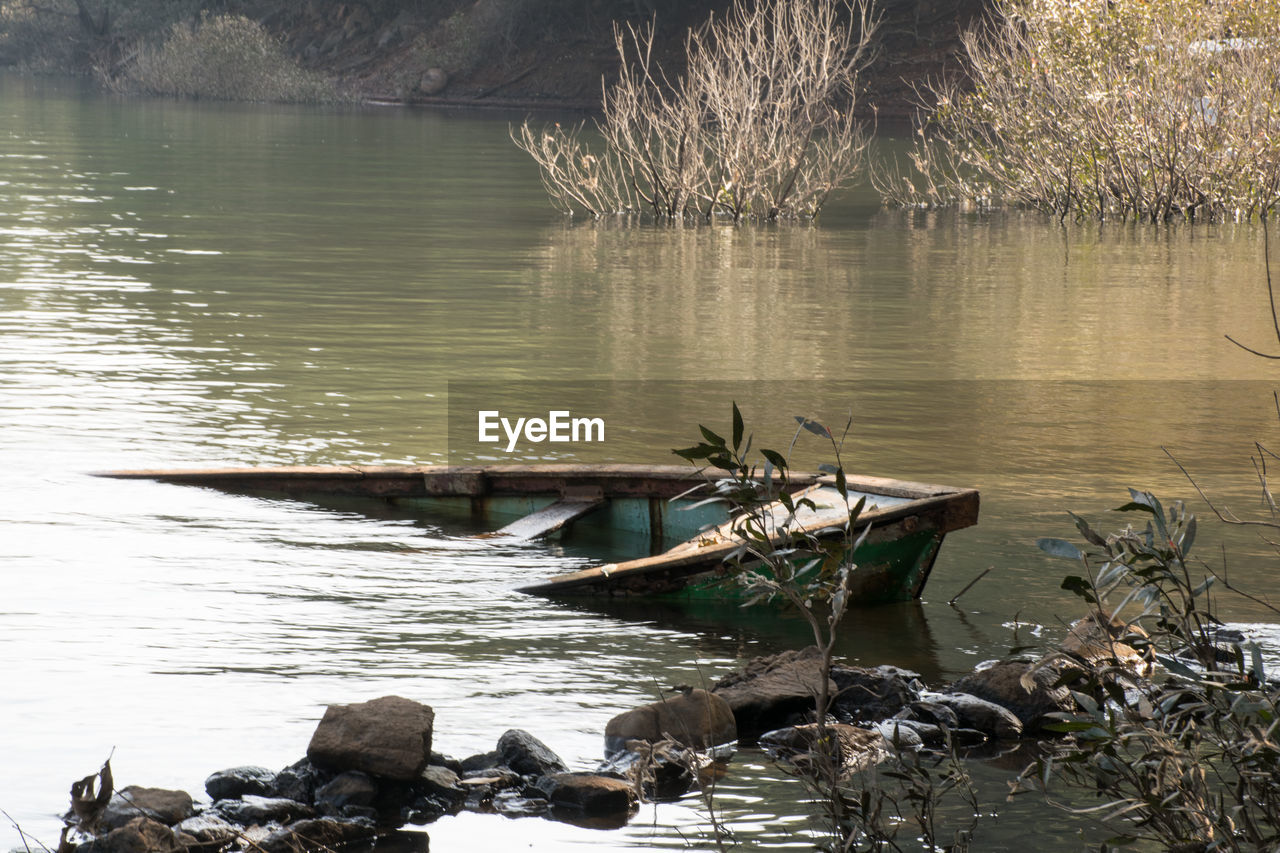 SCENIC VIEW OF LAKE WITH ROCKS