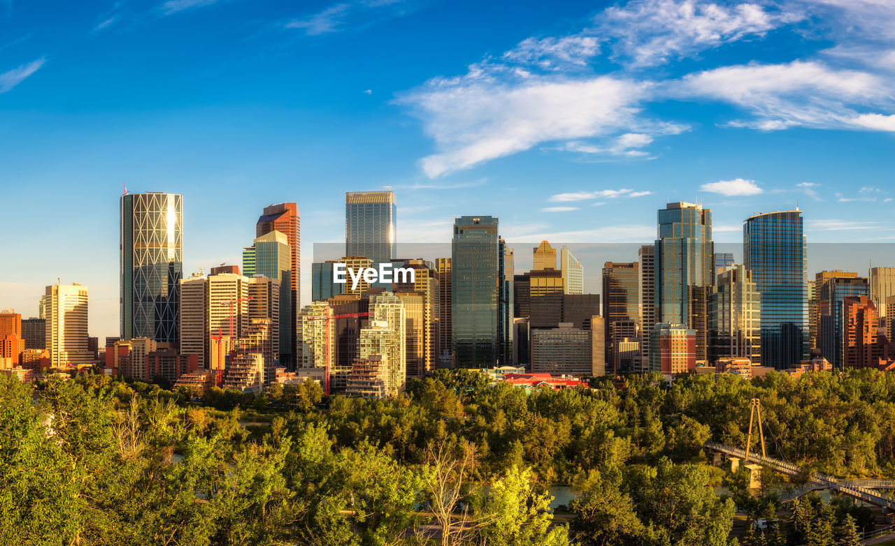 buildings in city against sky