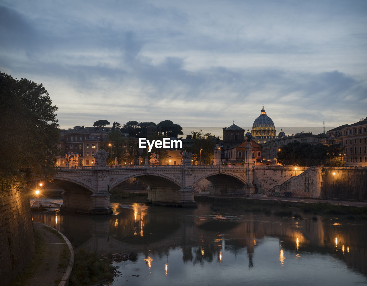Evening view of st. peter's basilica from ponte st. angelo.