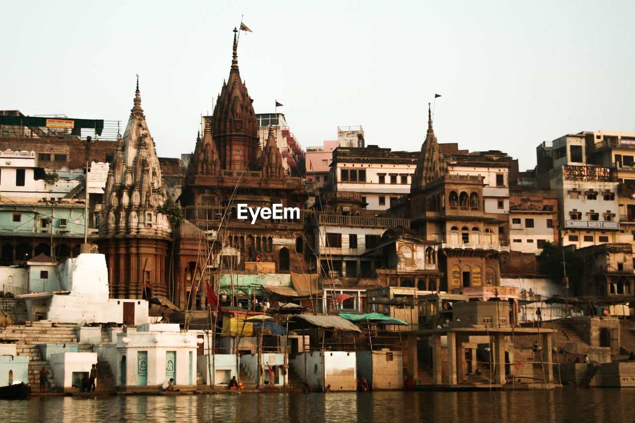 View of buildings on riverbank