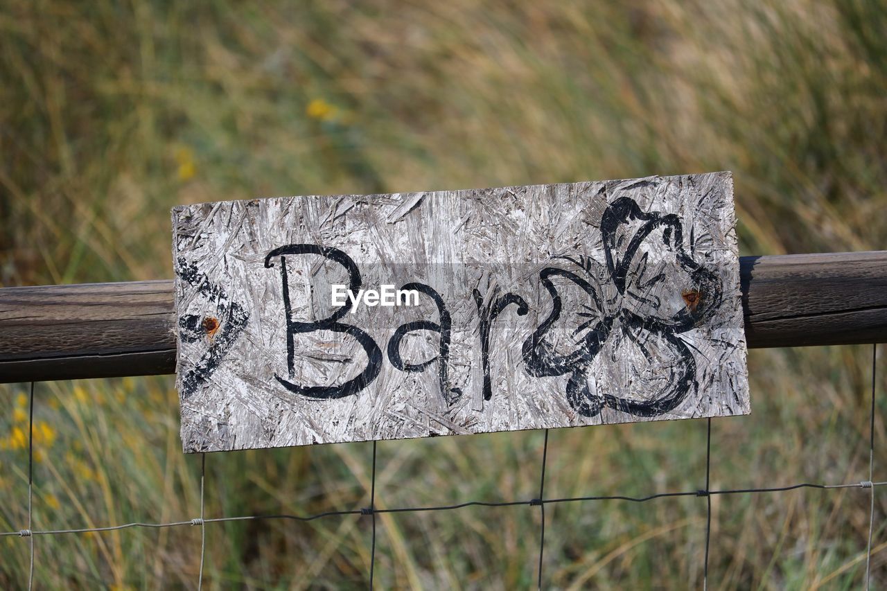 Close-up of text on wood