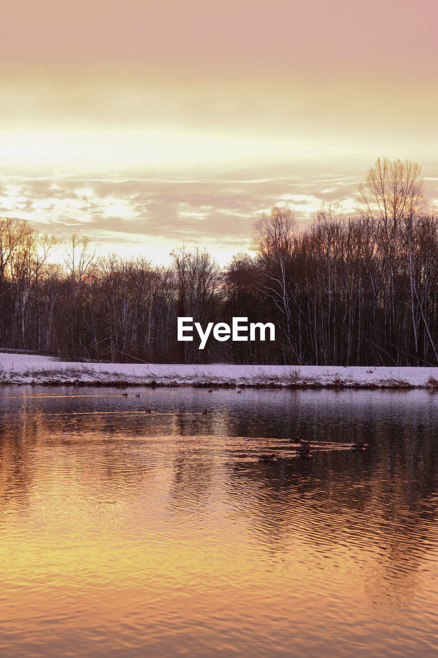 LAKE AGAINST SKY DURING SUNSET