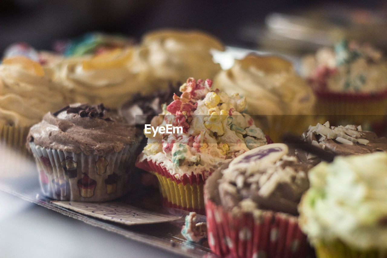 Close-up of cupcakes served on table