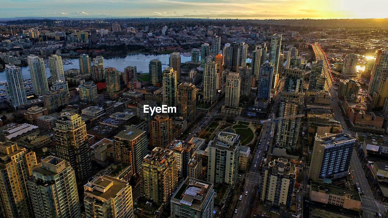 AERIAL VIEW OF ILLUMINATED CITYSCAPE