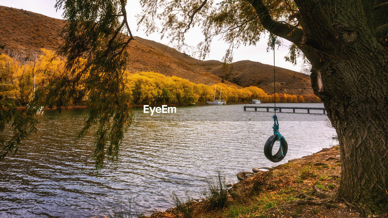 Scenic view of lake against sky during autumn