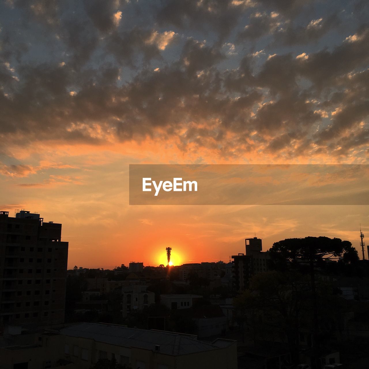 SILHOUETTE OF CITY AT SUNSET