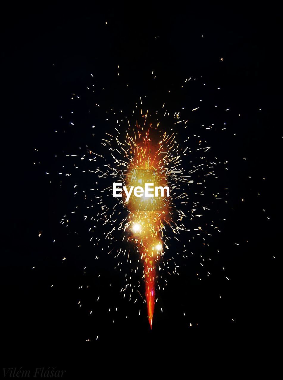 LOW ANGLE VIEW OF FIREWORK DISPLAY