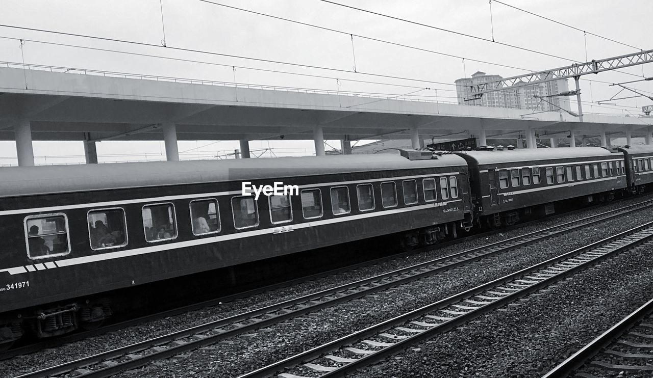 RAILROAD STATION PLATFORM AGAINST SKY