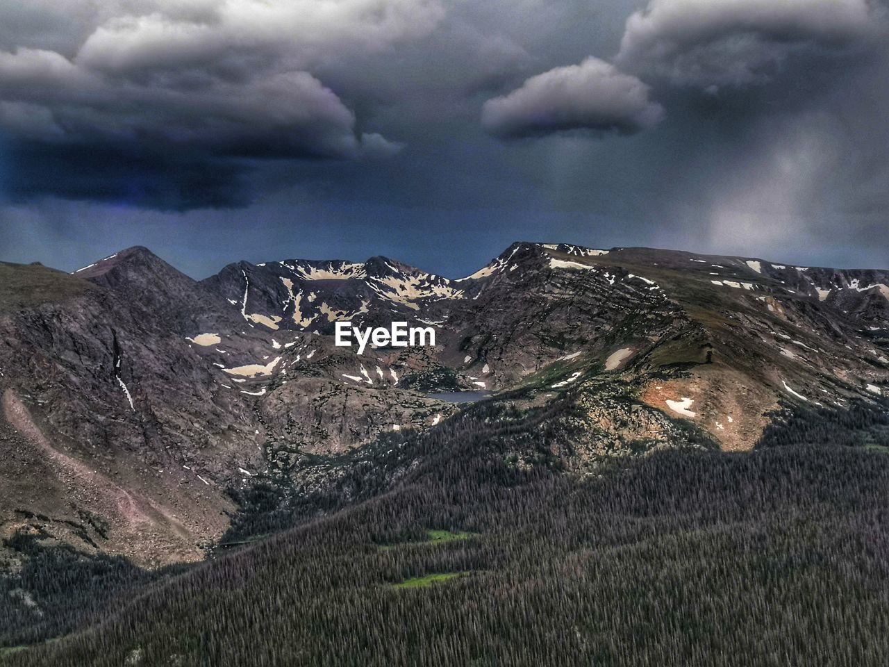 SCENIC VIEW OF SNOWCAPPED MOUNTAIN AGAINST SKY