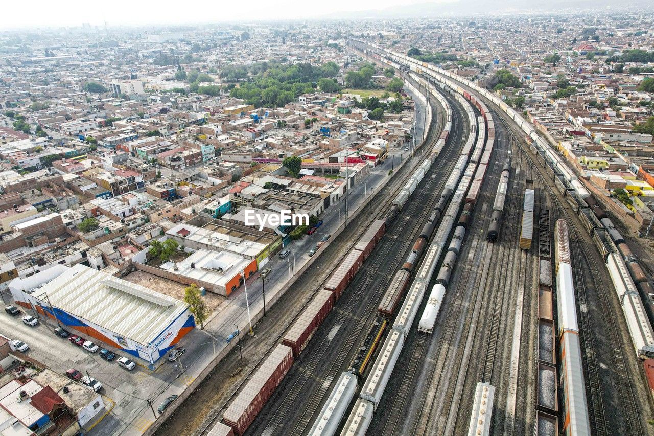 high angle view of people walking on road