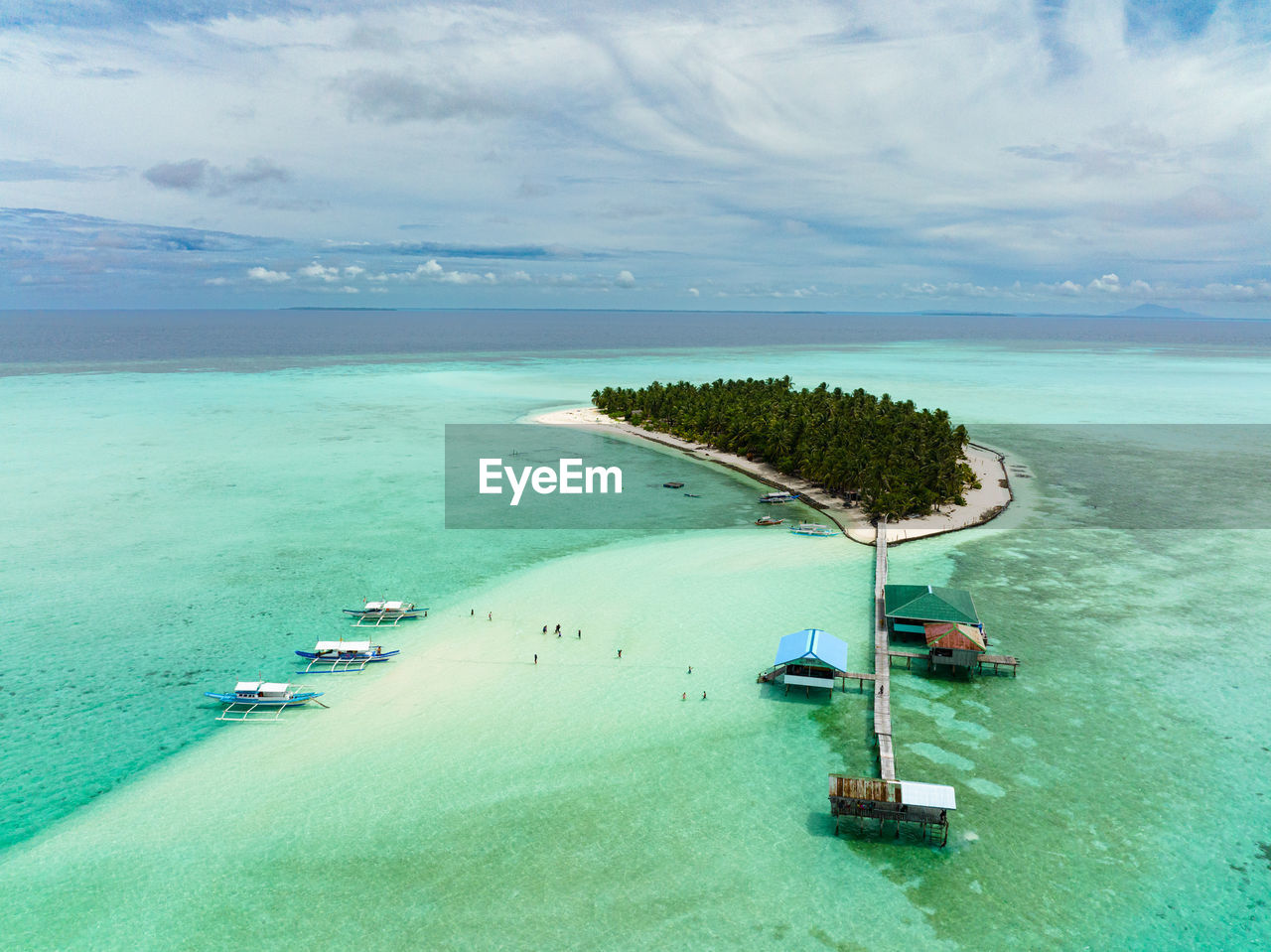 Aerial view of tropical island on an atoll with a beautiful beach. onok island, balabac, philippines