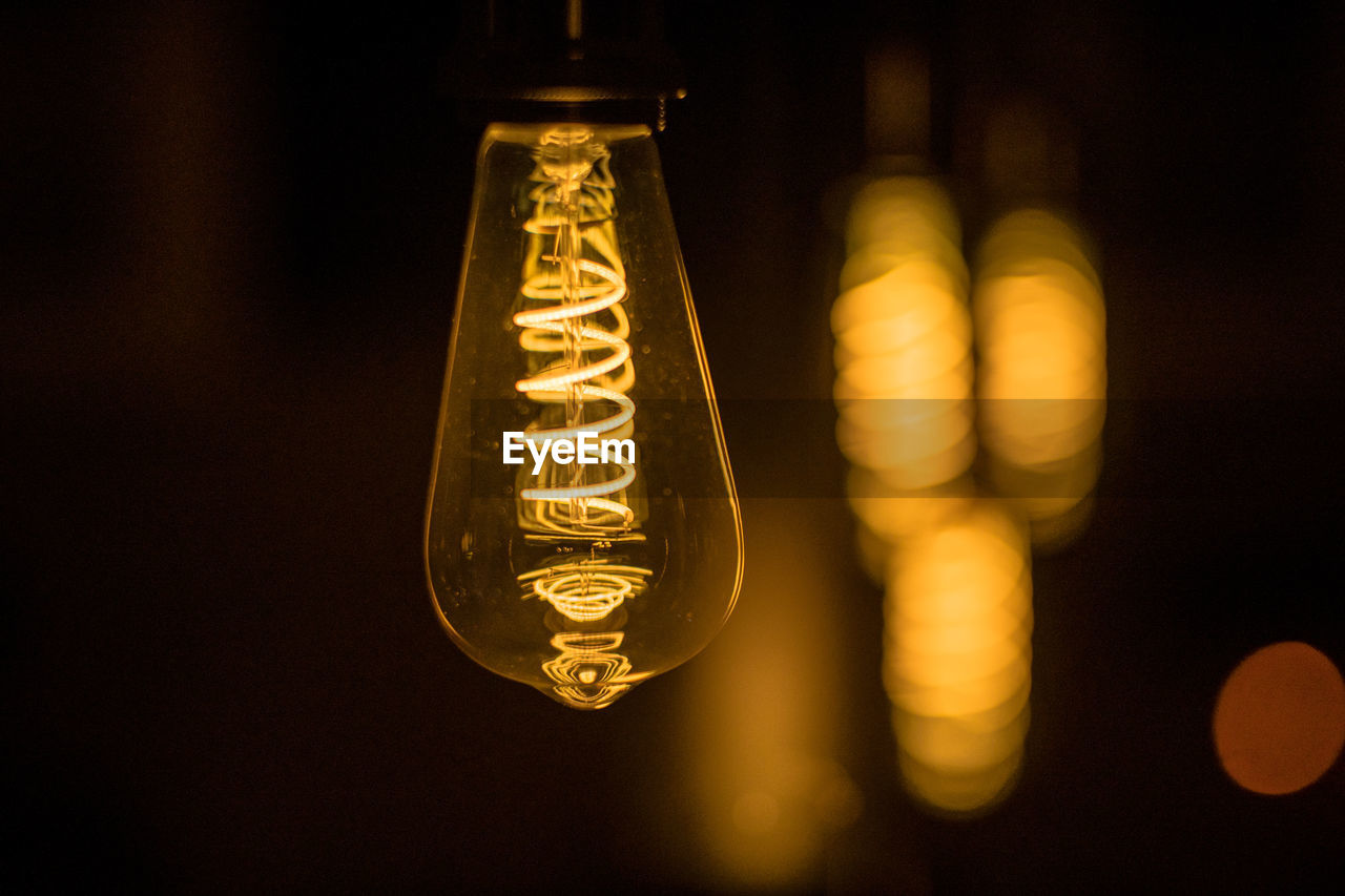 Close-up of illuminated light bulb