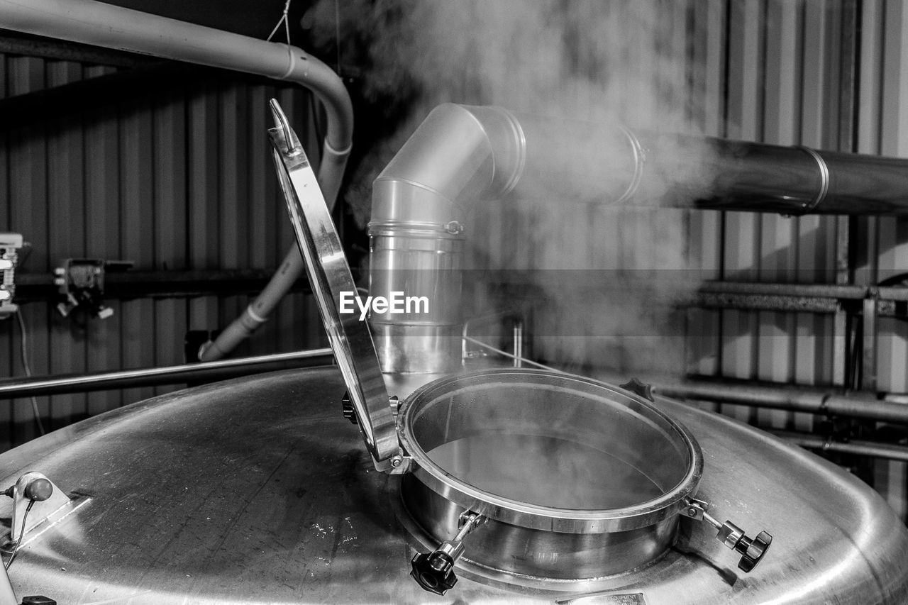 Steam emitting from storage tank in brewery
