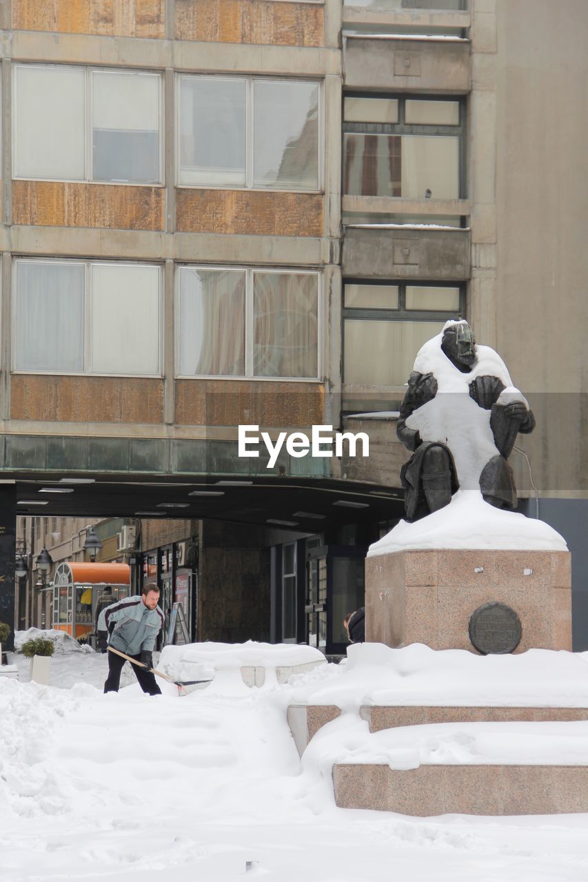 STATUE OUTSIDE BUILDING