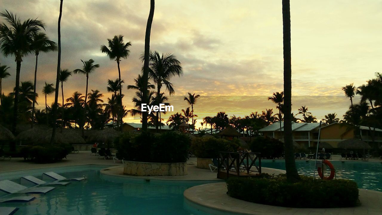 Swimming pool at sunset