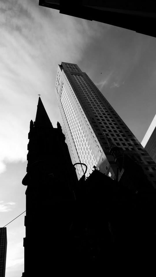 LOW ANGLE VIEW OF BUILDINGS AGAINST SKY