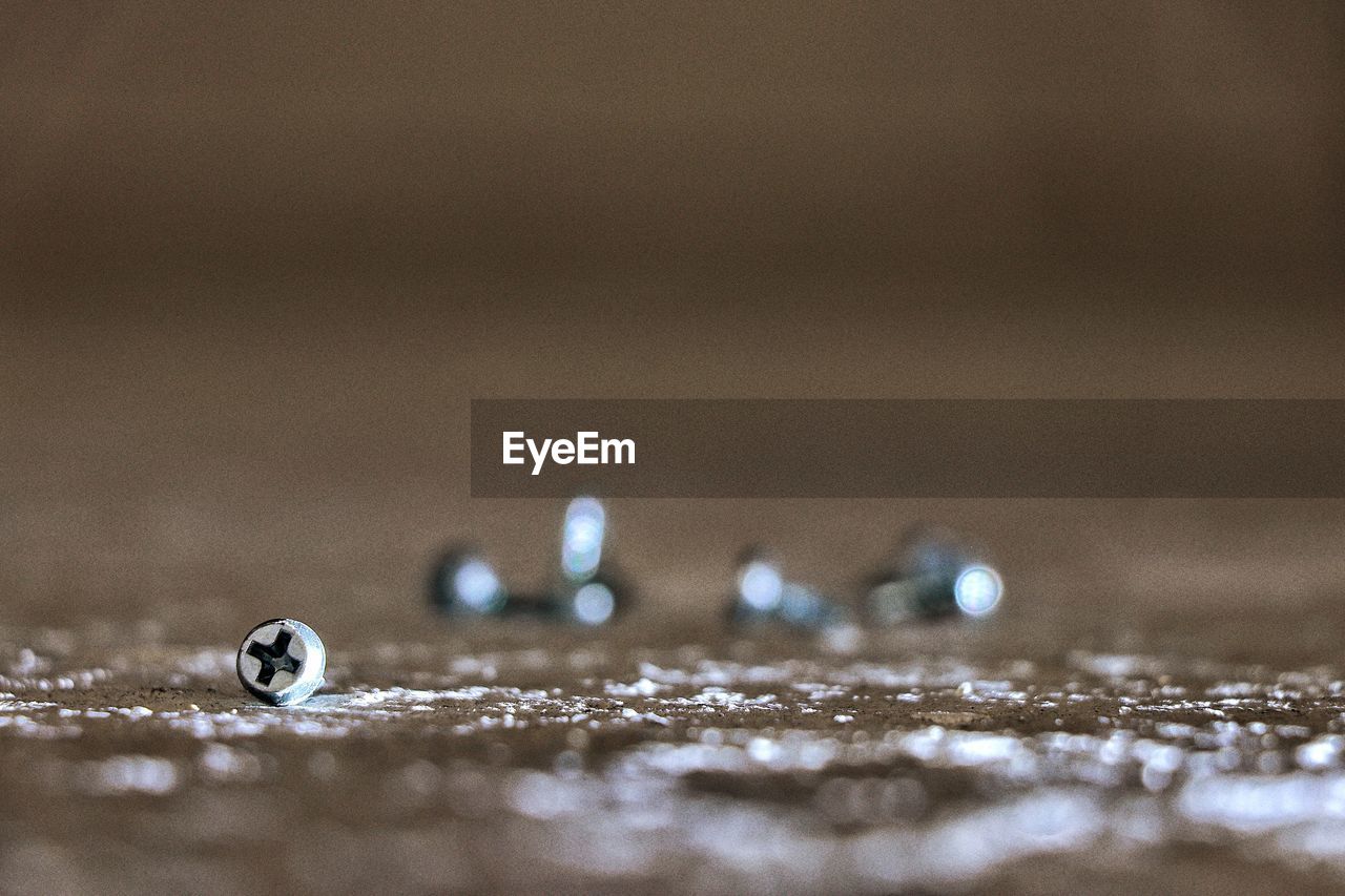 CLOSE-UP OF WATER DROPS ON THE SURFACE