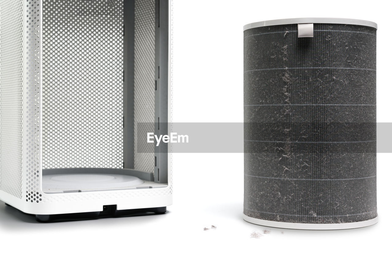 The filter of the air purifier have a lot of dust after use for long time on white background